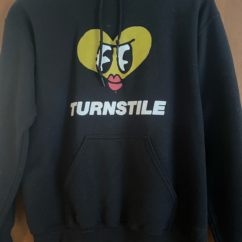 Gildan Black Hoodie with Yellow Heart Graphic and White TURNSTILE Logo